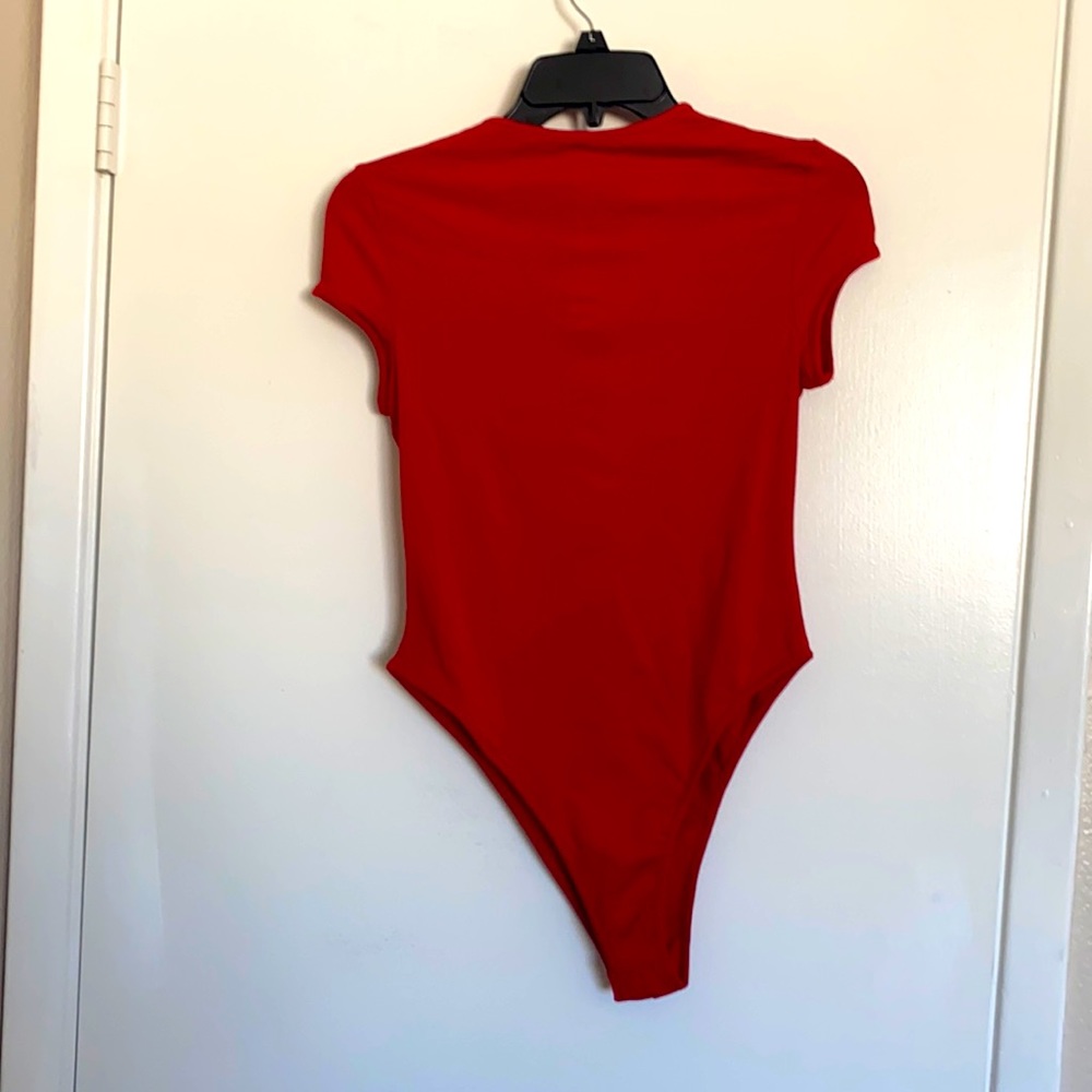 Never worn  red  high neck body suit